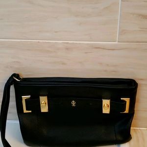 Jennifer Lopez Black leather wristlet